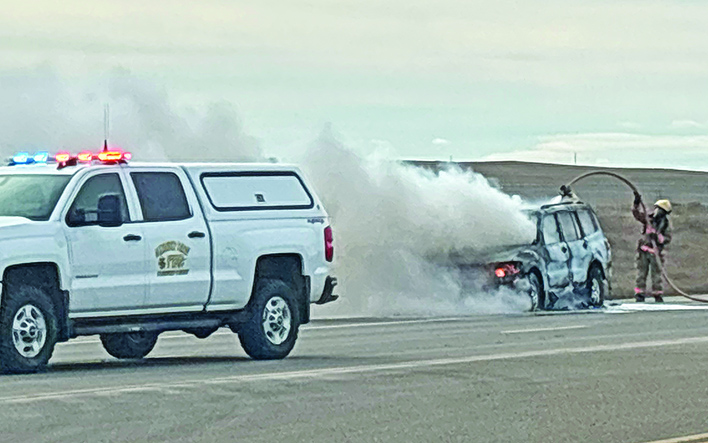 SUV destroyed in roadside blaze