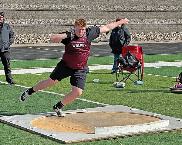 Boys track team powers through the weather
